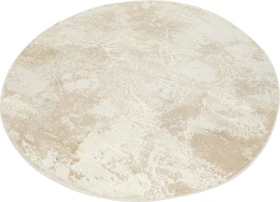 A round rug with a marble-like pattern in beige and brown tones.