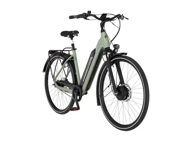 A light green electric bicycle is shown against a white background.
