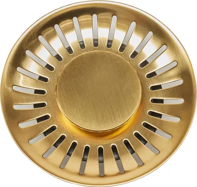 A close-up, top-down view of a gold sink strainer basket.