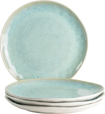 A stack of four plates with a light blue speckled glaze and a tan rim, presented on a white background.