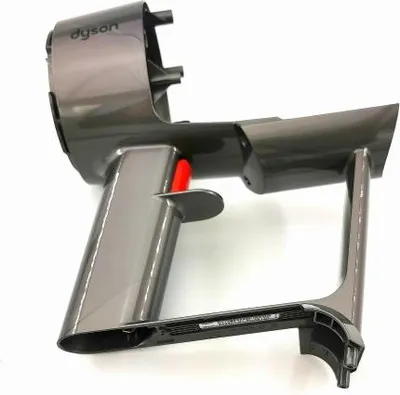 A gray Dyson V11 vacuum cleaner housing with a red trigger, shown against a white background.
