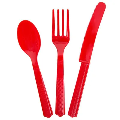 Three red plastic cutlery items (spoon, fork, knife) arranged on a white background.