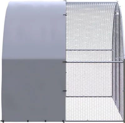 A side view of an outdoor chicken coop.