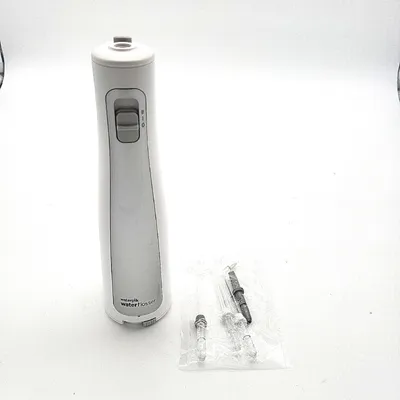 Produktbild von Waterpik Wasserstrahlgerät Mundpflege Freedom Jet tragbar kabellos Reise