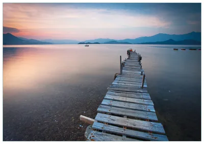 Produktbild von Wallario Premium Glasbild, freischwebende Optik, kräftige Farben, Größe 100 x 70 cm Motiv Steg am See- Idylle bei Sonnenuntergang