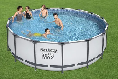 People enjoying a Bestway Steel Pro MAX above-ground swimming pool on a grassy lawn.