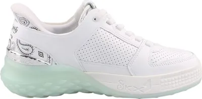 A side view of a white Skechers sneaker with a translucent green sole.