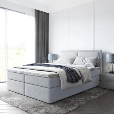 A bedroom scene featuring a bed.
