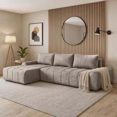 A modern living room with a sectional sofa, a floor lamp, and wall art.