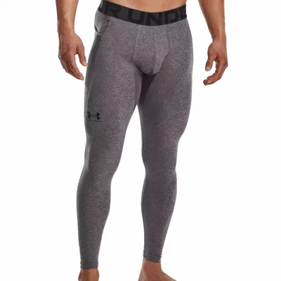 A man wearing grey leggings.