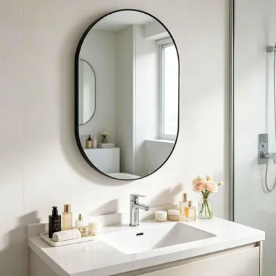 Productafbeelding van Zimilo Wandspiegel, ovaal, 80x50 cm, spiegel voor de badkamer met veiligheidsglas, heldere reflectie, geschikt voor badkamer, slaapkamer en woonkamer, zwart