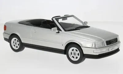 Produktbild von MCG MCG181225 - 1:18 Audi Cabriolet, silber, 1991 - Neu
