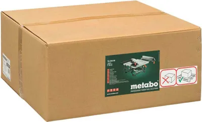 A cardboard box containing a table saw.