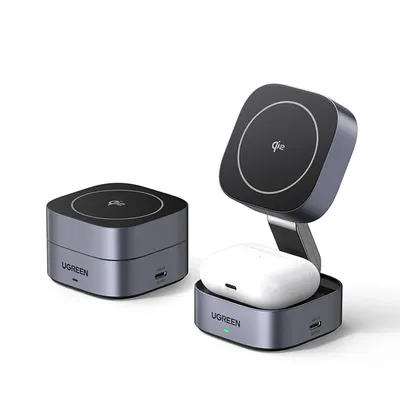 Two wireless charging devices are shown against a white background. One is a compact, square charger, and the other is a stand-style charger with a phone or earbuds case on it.