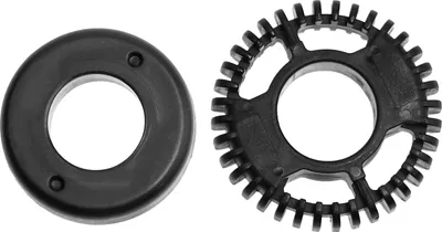 Two black plastic components, one a solid ring and the other a gear-like disc, are placed side-by-side.