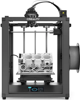 A 3D printer is shown with a model of an engine block being printed.