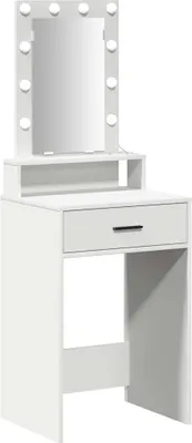 A white vanity table with a mirror and lights.
