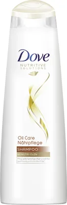 A white bottle of Dove shampoo against a white background.