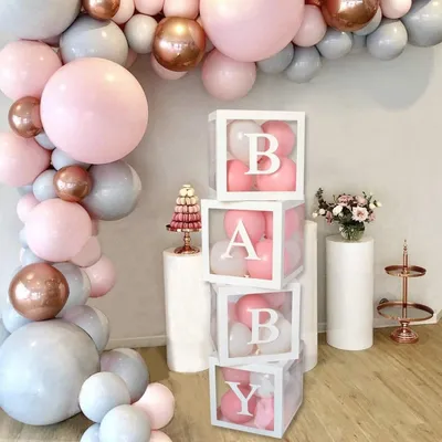 Zdjęcie produktu dla Zestaw dekoracji na przyjęcie dla przyszłej mamy, zawierający 4 białe pudełka i literki "BABY"