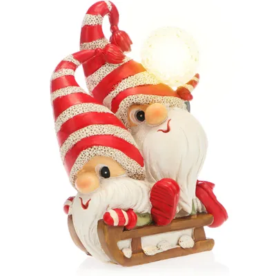 Produktbild von com-four® LED Wichtelfigur auf Schlitten - süße Weihnachtsdekoration mit Licht - weihnachtliche Wichtel-Deko zum Hinstellen - Weihnachtsdeko