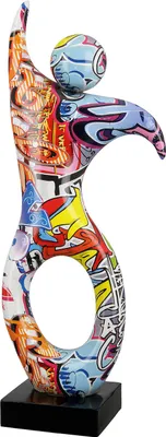 A colorful, abstract sculpture of a dancer on a black base.