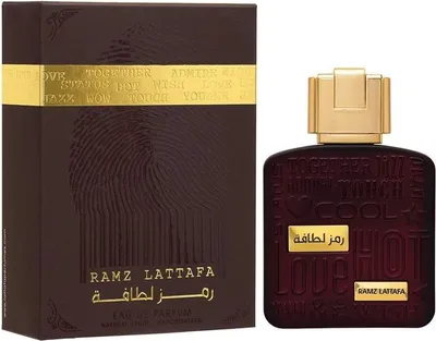 A perfume bottle and its box are displayed side-by-side against a white background.