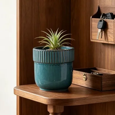 Productafbeelding van Keramische plantenpot, diameter 23 cm, hoogglans, met ribbels, ademend, vorstbestendig, met afvoergaten. Kleur: turkoois