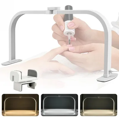 Immagine prodotto di Lampada a mezzaluna - Lampada LED da tavolo per manicure - Pieghevole - Per estetiste specializzate in unghie - Con supporto per cellulare - 3 modalità di colore - Luce regolabile