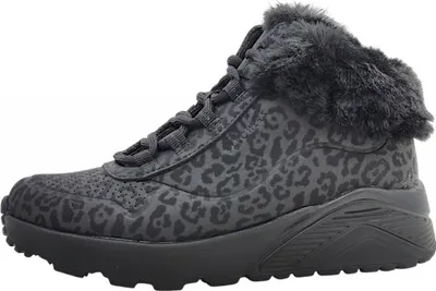 A side view of a black Skechers Uno Lite sneaker with a leopard print pattern and faux fur trim.