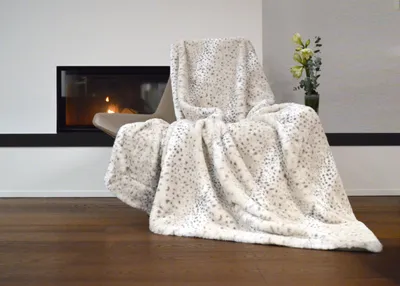 Produktbild von Wohndecke Schneeleopard