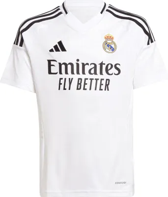 A white Real Madrid football jersey for children.
