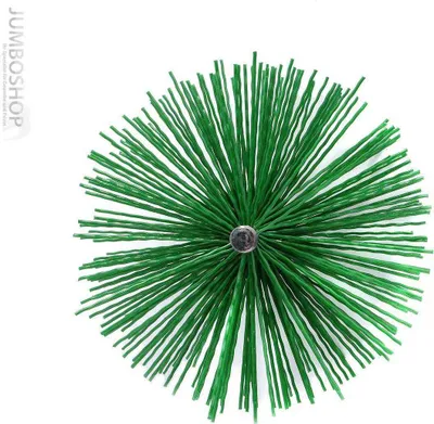 A top-down view of a green chimney brush with its bristles spread out.