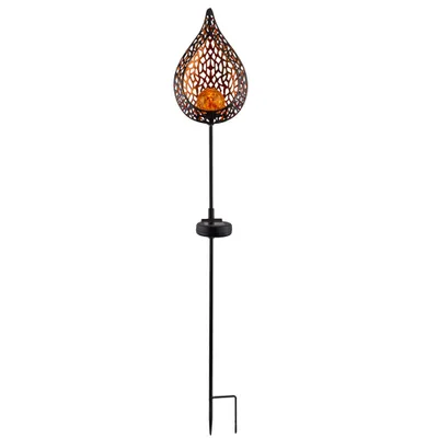 A black solar garden stake light with a decorative teardrop-shaped lantern containing an orange glass ball.