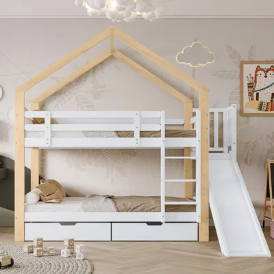 A children's bunk bed with a house-shaped frame, slide, and drawers, set in a bedroom with decorative wallpaper.