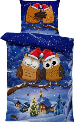 A Christmas-themed duvet cover and pillowcase set featuring cartoon owls in a snowy village scene.