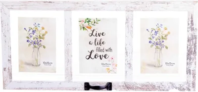 A white, distressed-finish multi-photo frame with three openings. The center opening contains a motivational quote, and the two side openings contain floral images. A black handle is attached to the bottom center.