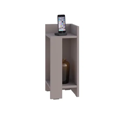 A modern gray nightstand with a shelf holding a brown vase and the top surface displaying a smartphone on a charging dock.