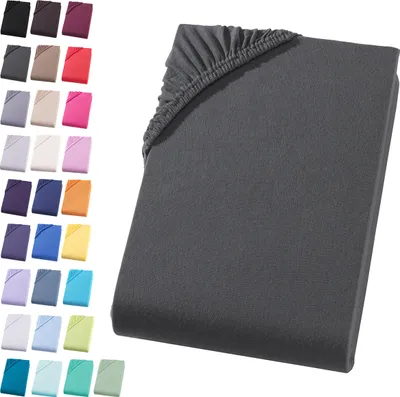 A dark gray fitted sheet is shown on a white background, with a swatch of many other colors of fitted sheets to the left.