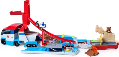 A toy Paw Patrol transporter with a ramp and a small vehicle.