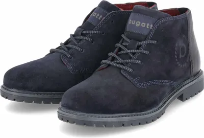 A pair of dark blue suede boots.