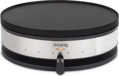 A close-up studio shot of a black and silver electric crepe maker.