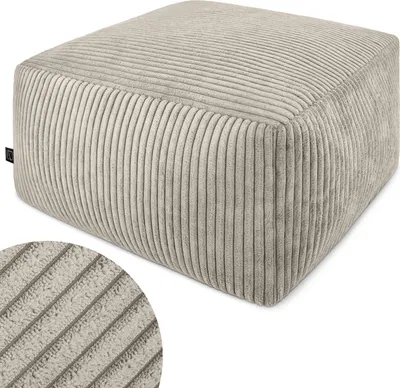 A beige corduroy pouf on a white background.