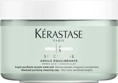 A product shot of a hair product container.