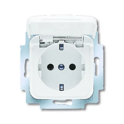 A close-up, front-facing view of a white electrical outlet with a hinged cover.