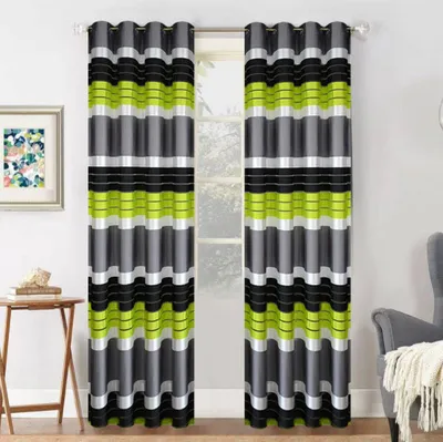 Two curtains with a striped pattern of gray, green, black, and white are hanging in front of a window. A small table with books is to the left, and a chair is to the right.