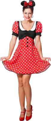 A woman is posing in a Minnie Mouse costume against a white background.