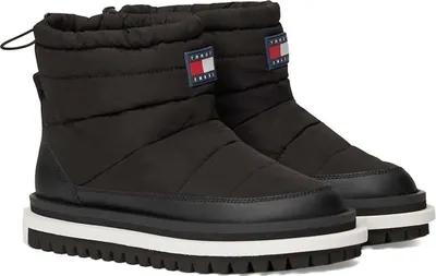 A pair of black winter boots on a white background.