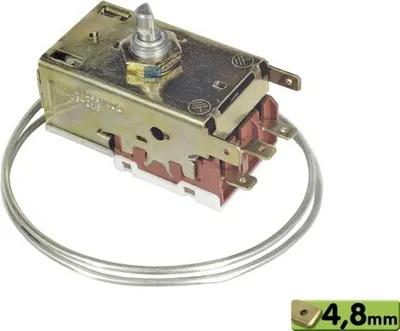 A close-up view of a refrigerator thermostat with a wire coiled around it.