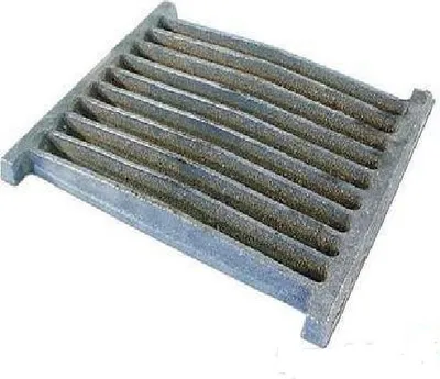 A gray metal grate is shown against a white background.