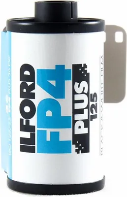 A roll of Ilford FP4 PLUS 125 black and white film.